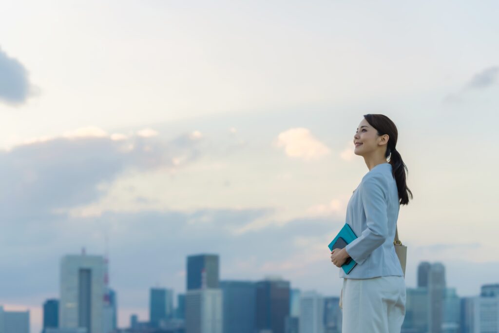 a woman standing on a rooftop